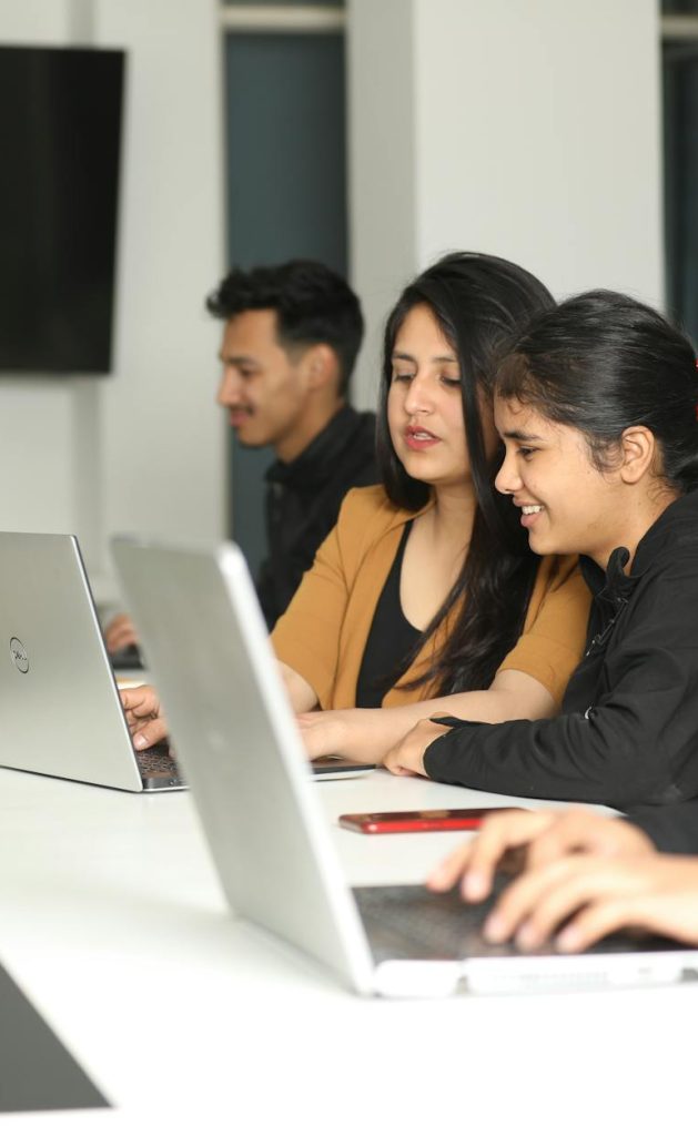 Young professionals collaborating in a modern coworking space in Kathmandu, Nepal.